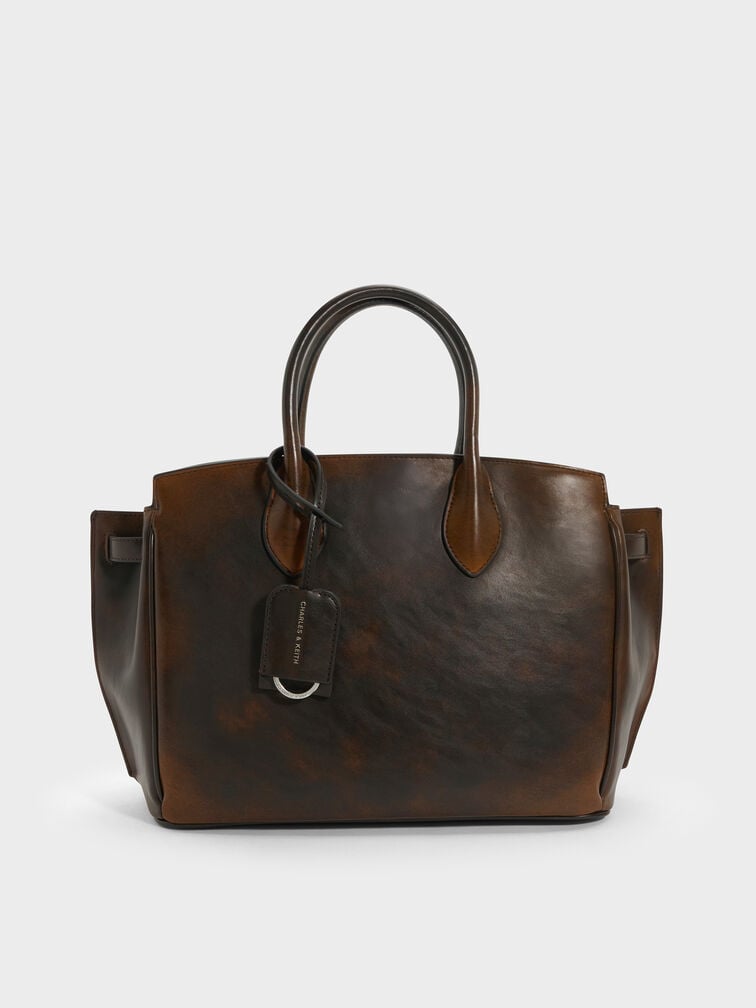A Bag Designed Around a Softly Structured Silhouette