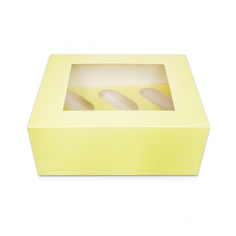 A Box Built For Cupcakes That Actually Have Decoration On Top