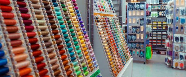 Rows of colorful thread and sewing notions inside Manhattan Wardrobe Supply