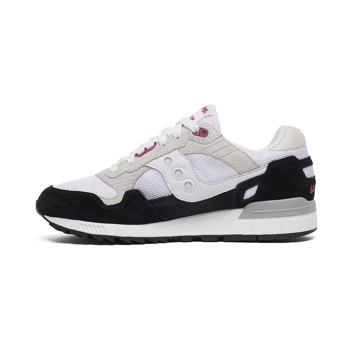 White, gray, and black Saucony Shadow 5000 sneaker shown from the side.