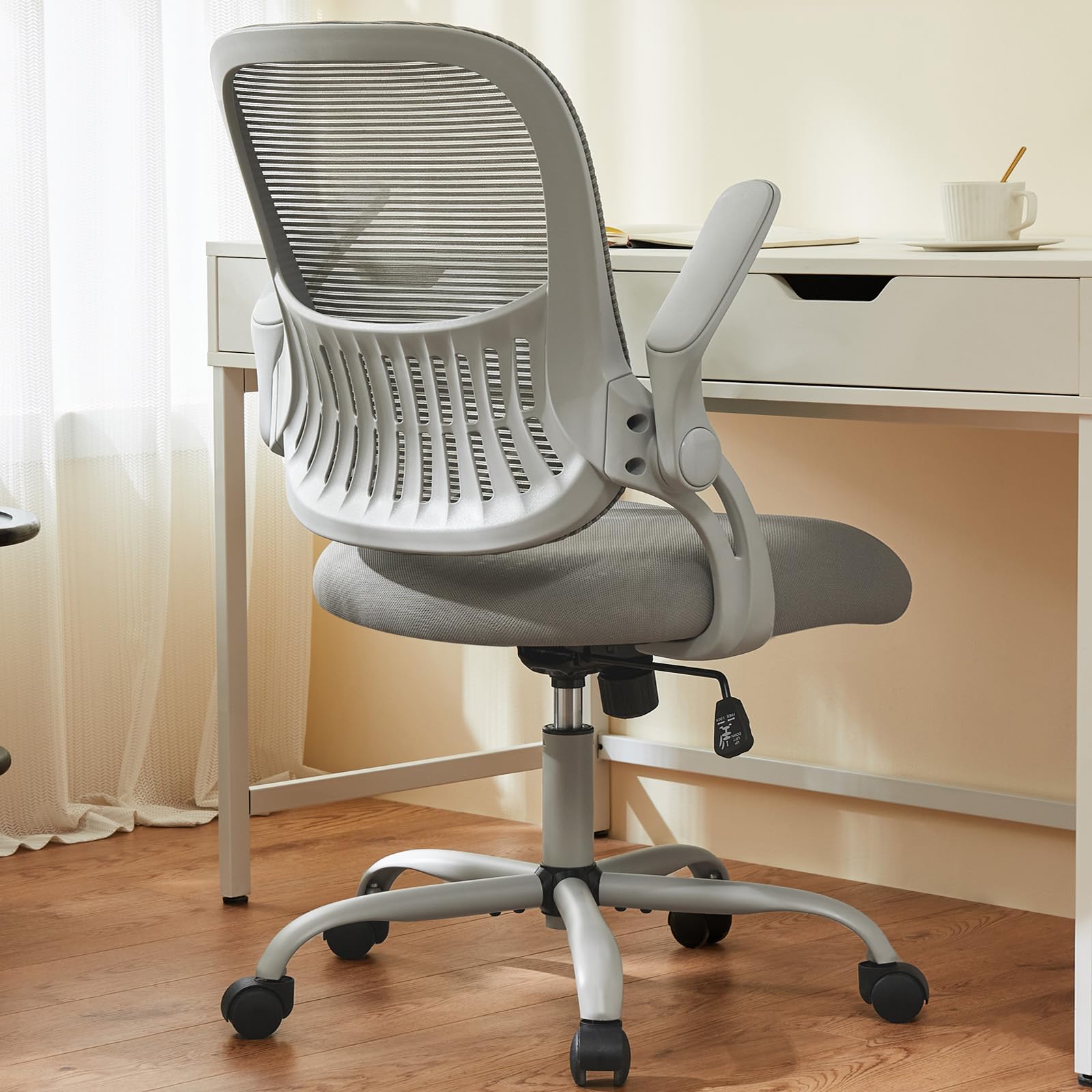 Gray Sweetcrispy ergonomic mesh office chair at a white desk