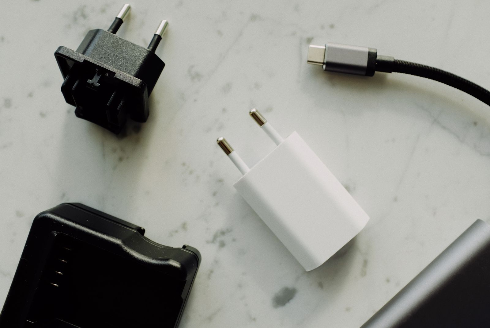 USB charging cables and connectors arranged together