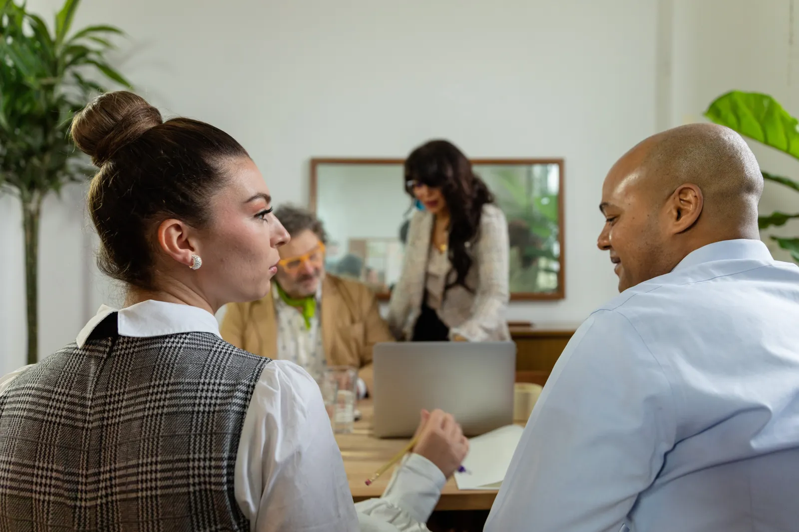Colleagues collaborating around a table