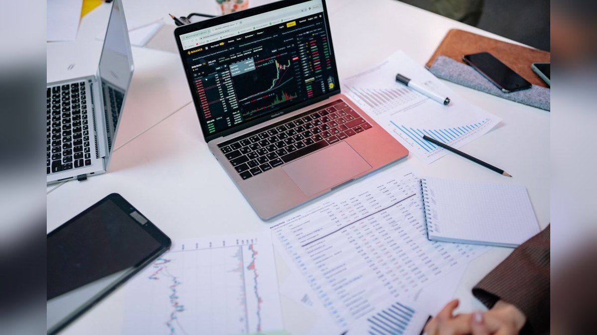 Illustrative stock photograph of financial charts on a laptop