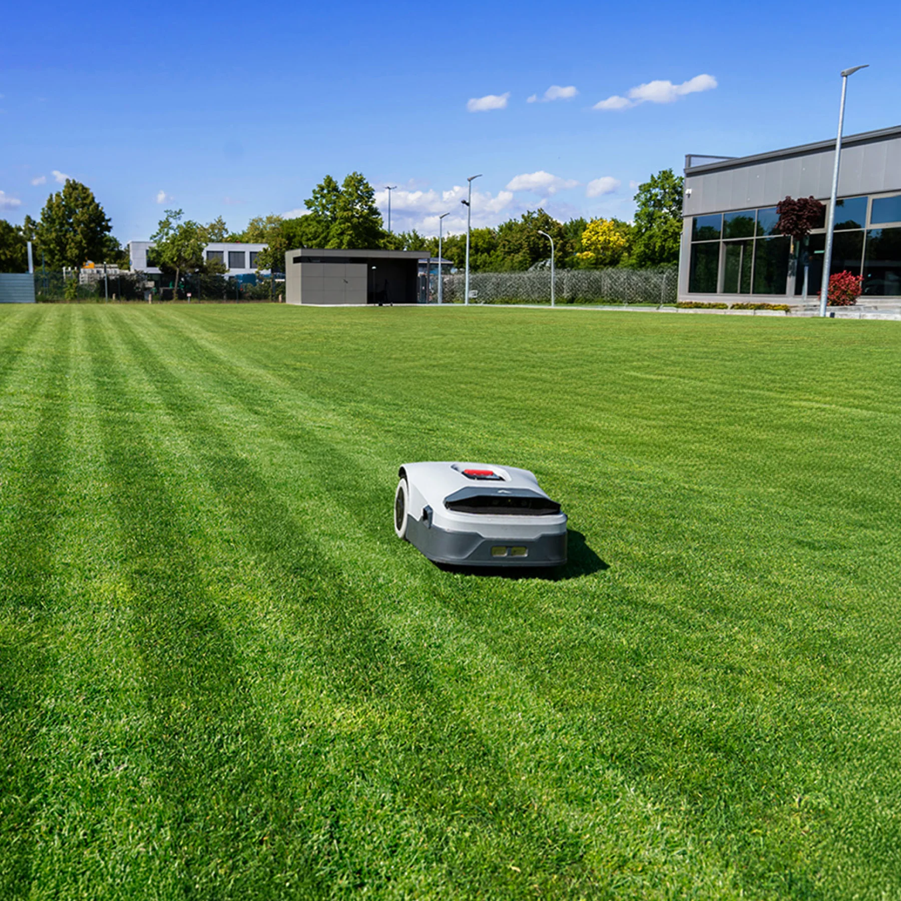 ANTHBOT robotic mower maintaining a lawn