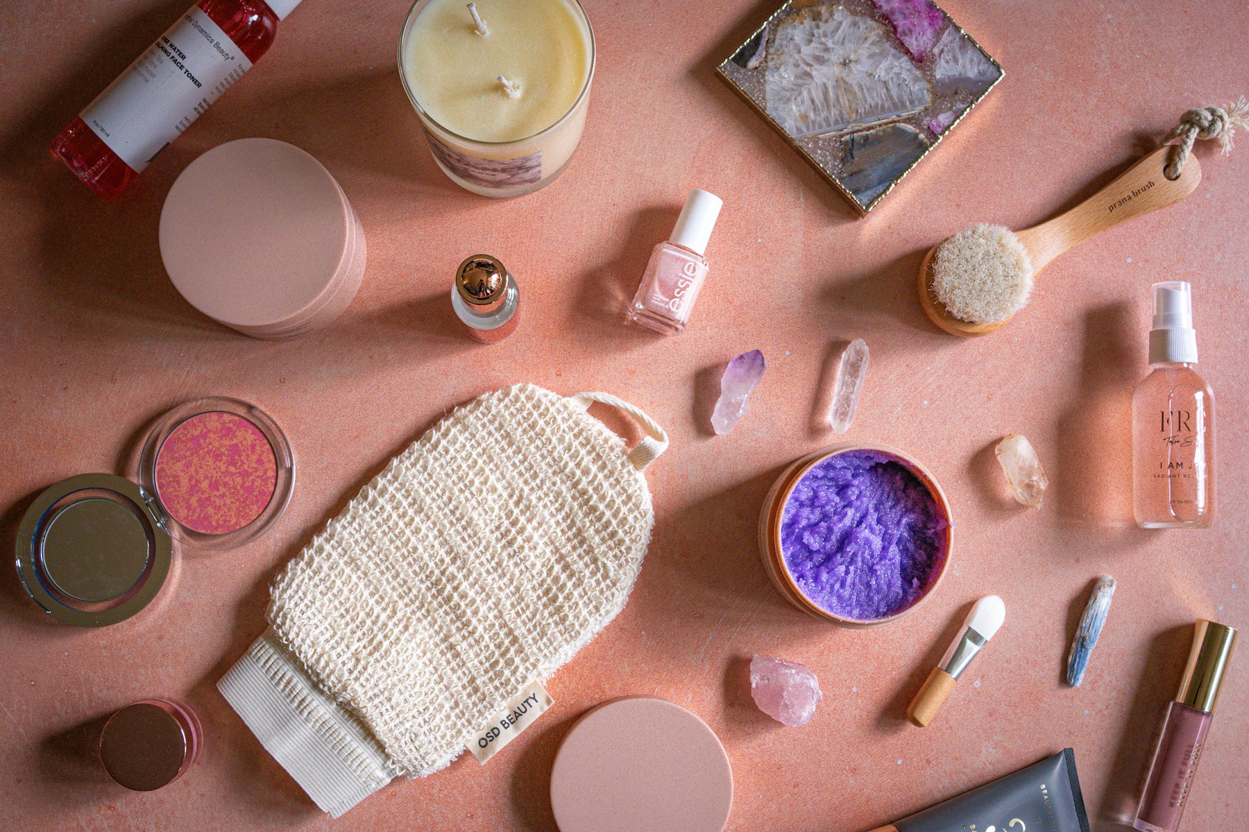 Assorted beauty and cosmetics products arranged on a table