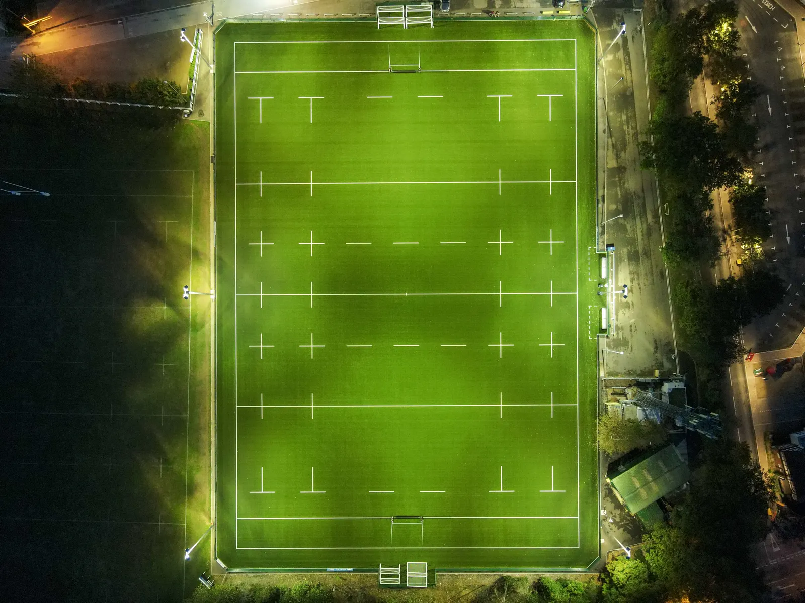 Rugby stadium pitch and stands ready for a match
