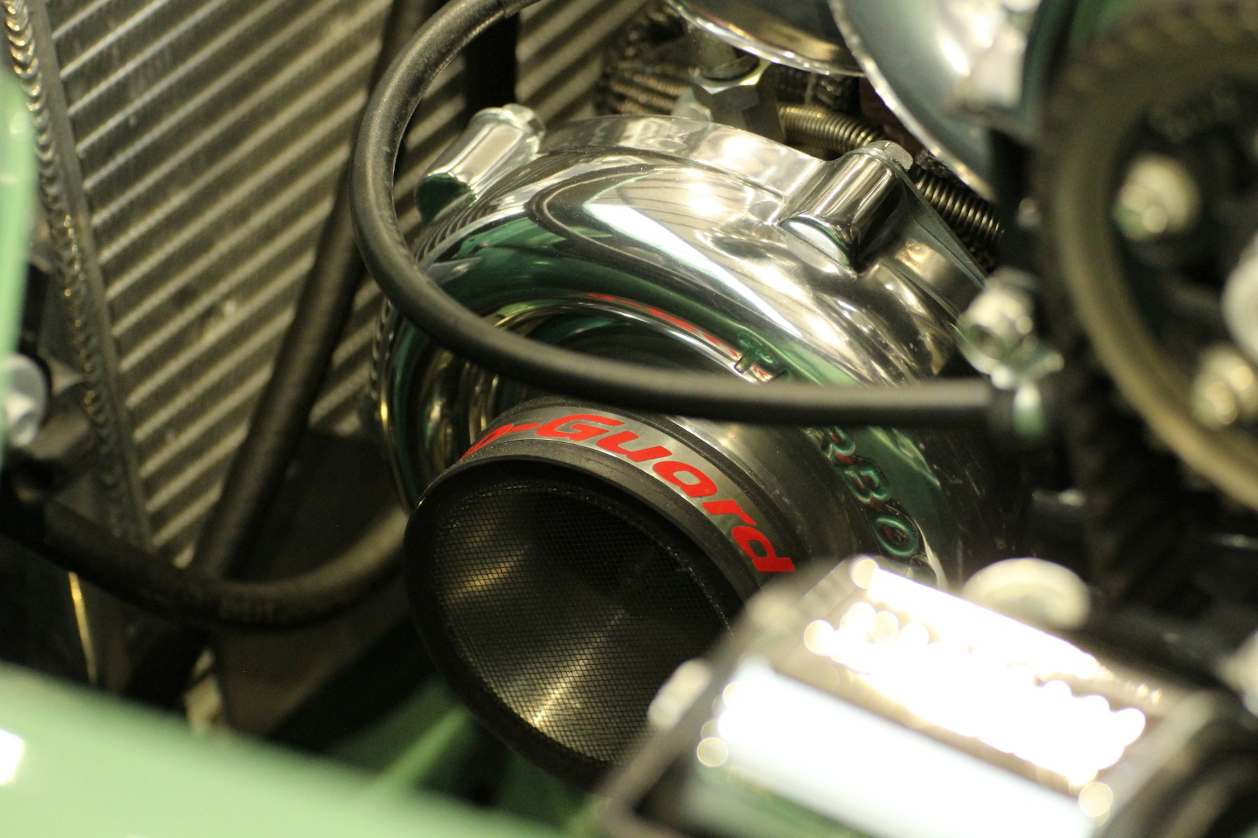 Close-up view of a car engine and mechanical components