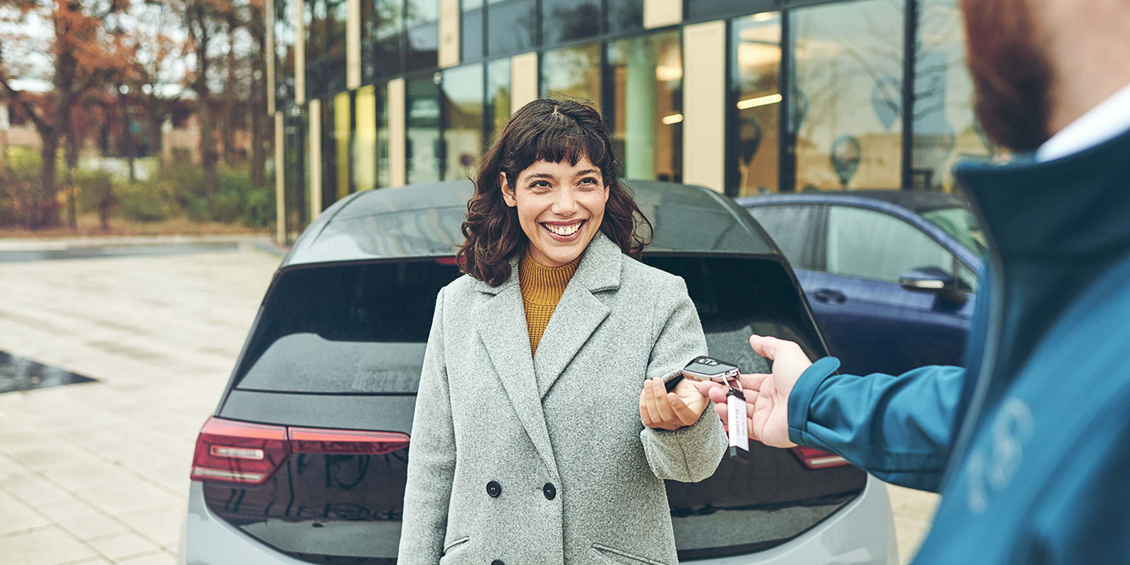 Rental car key handover by VW FS Rent-a-Car