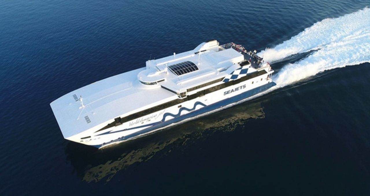 Ferry sailing to Santorini featured by Ferryhopper