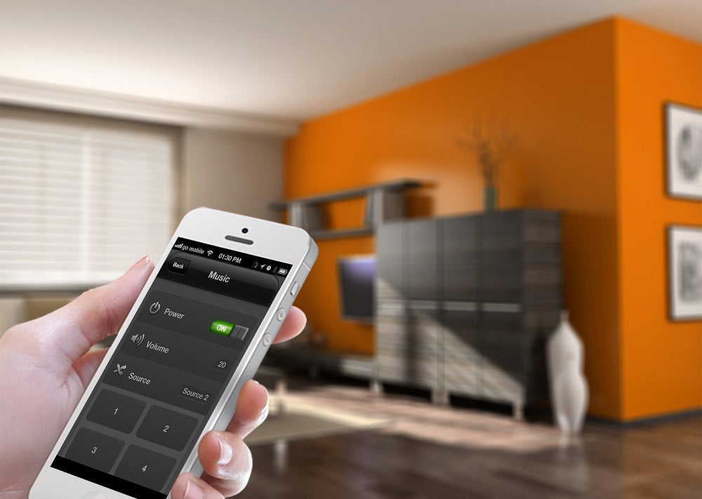 Hand using a smartphone smart-home control app in a contemporary living room